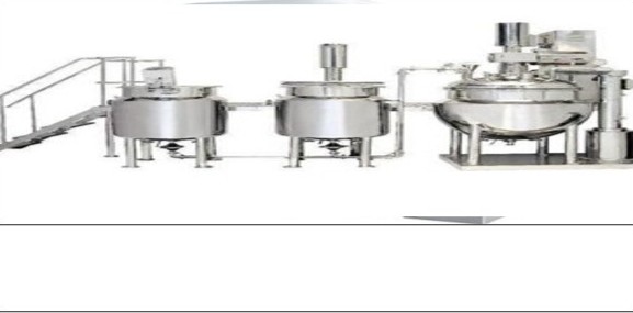 Line of jacketed cooking kettles with access platform